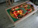 Photo of the DIY coffee table made from a pinball playfield