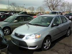 Corolla with a funny hood ornament