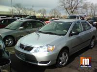 Corolla with a funny hood ornament